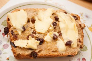 Buttered slice of Bara Brith Fruit Loaf