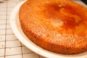 Moist Orange Sponge cake after covering with the orange and cinnamon syrup
