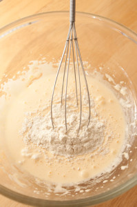 Adding flour to yolk mix